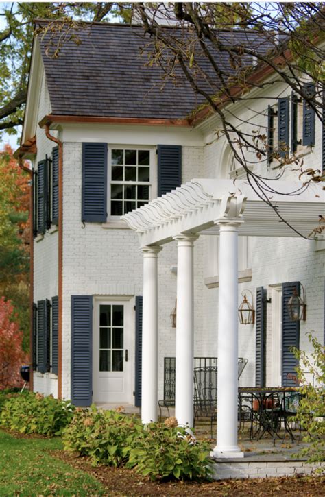 white house navy blue shutters.